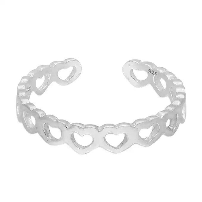 Silver bracelet with heart designs on a white background