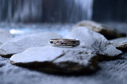 Close-up of hammered pattern on 925 sterling silver ring, showcasing its one-of-a-kind contours.