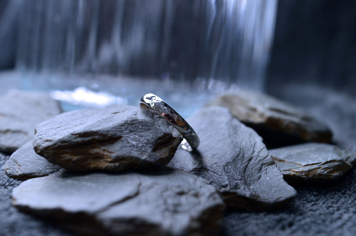 Handcrafted 3 x 2mm sterling silver hammered ring with unique textured finish by Dela Comeco.