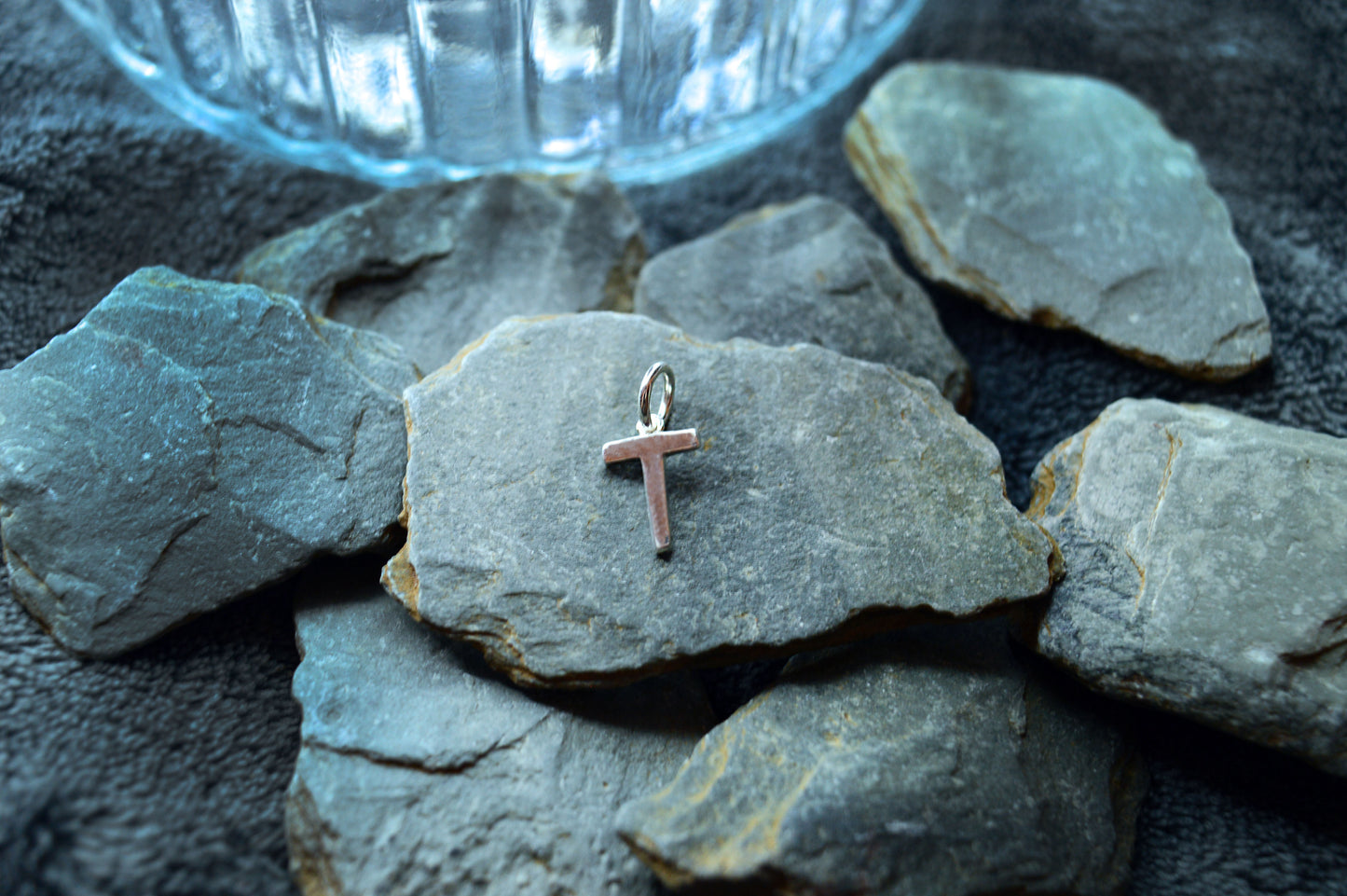 925 sterling silver initial pendant with a dainty, 1.5mm thick letter and a 5.5mm external loop for easy attachment.