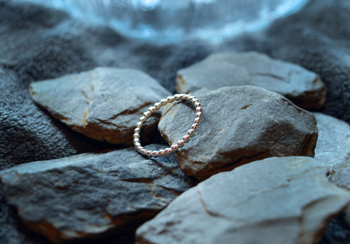 Elegant 925 sterling silver beaded ring featuring a delicate 2mm band. Ideal for layering with other rings or as a subtle statement piece.