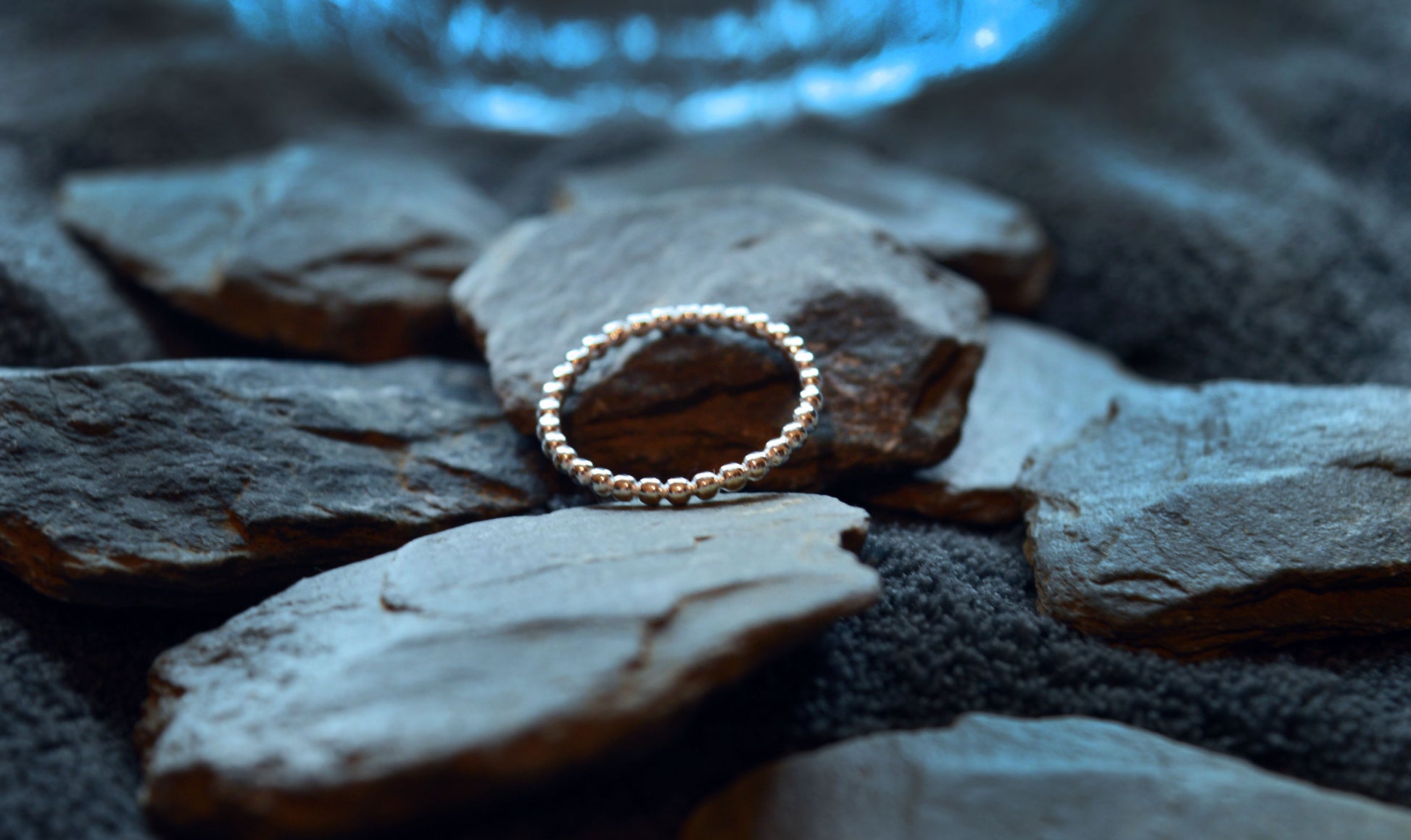 Stylish 925 sterling silver beaded ring showcasing a simple, 2mm band. Perfect for adding a touch of elegance to any ring stack or wearing solo.