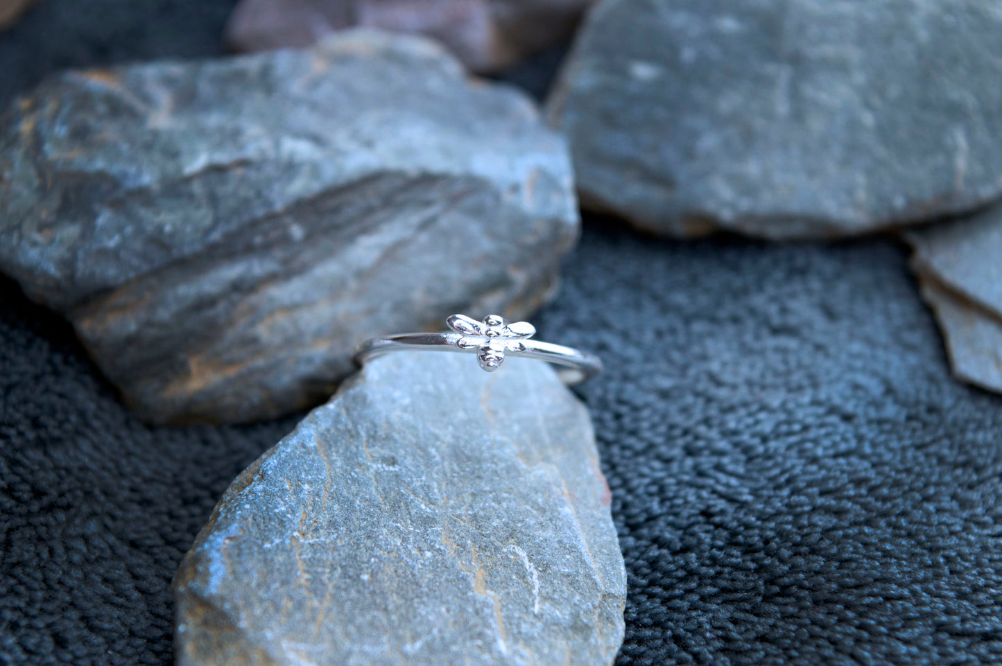 Small 925 silver stacking ring. The ring is 1.5mm thick with a unique bee sculptured on top. This is from our animal inspired jewellery range.