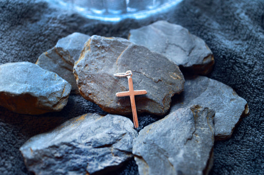 Sterling silver cross pendant. pre looped with a 4mm ring. Pendant size, height 22mm width 13mm.