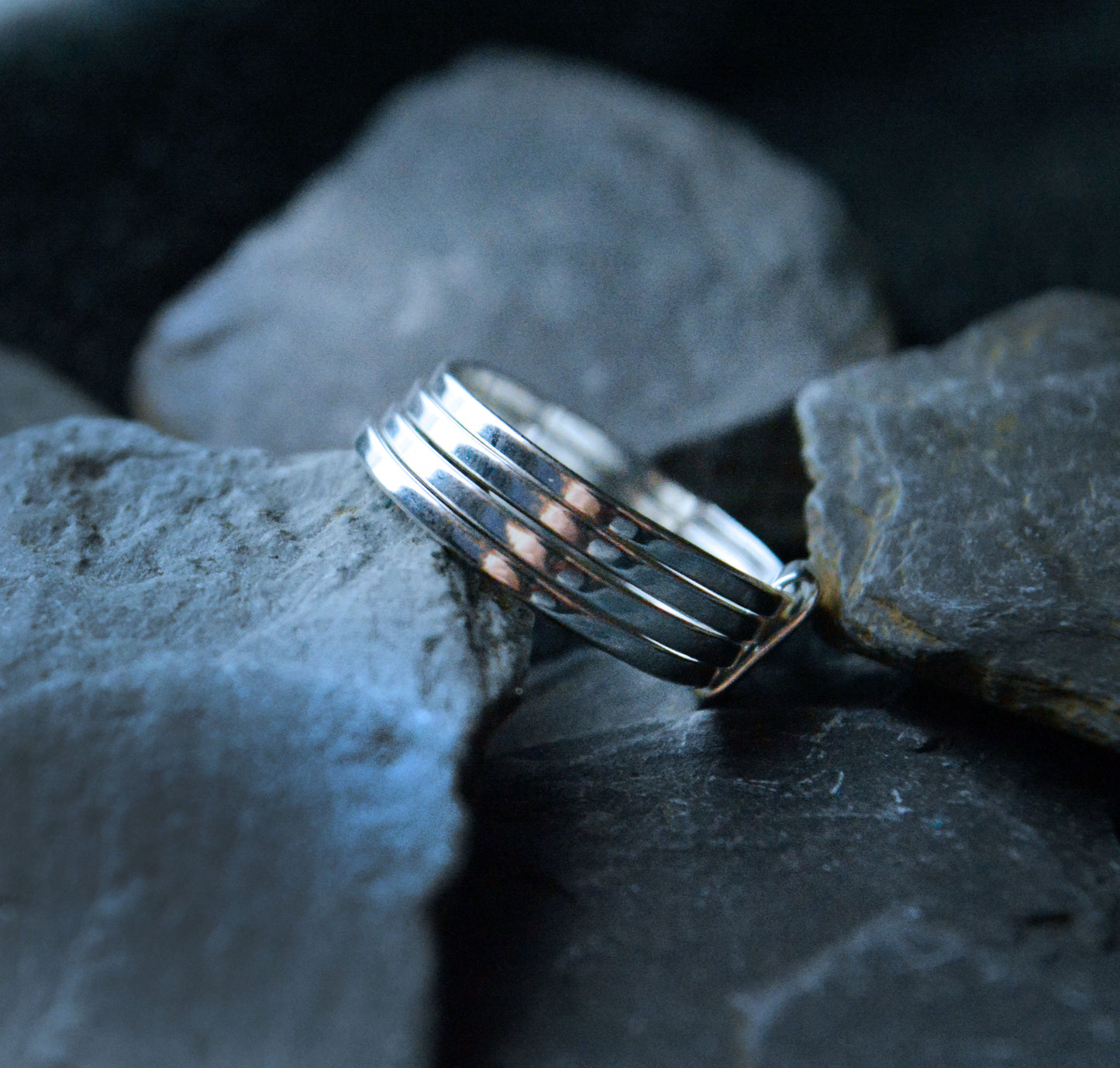 silver stacking ring. Four 1mm bands joined to make this ring.