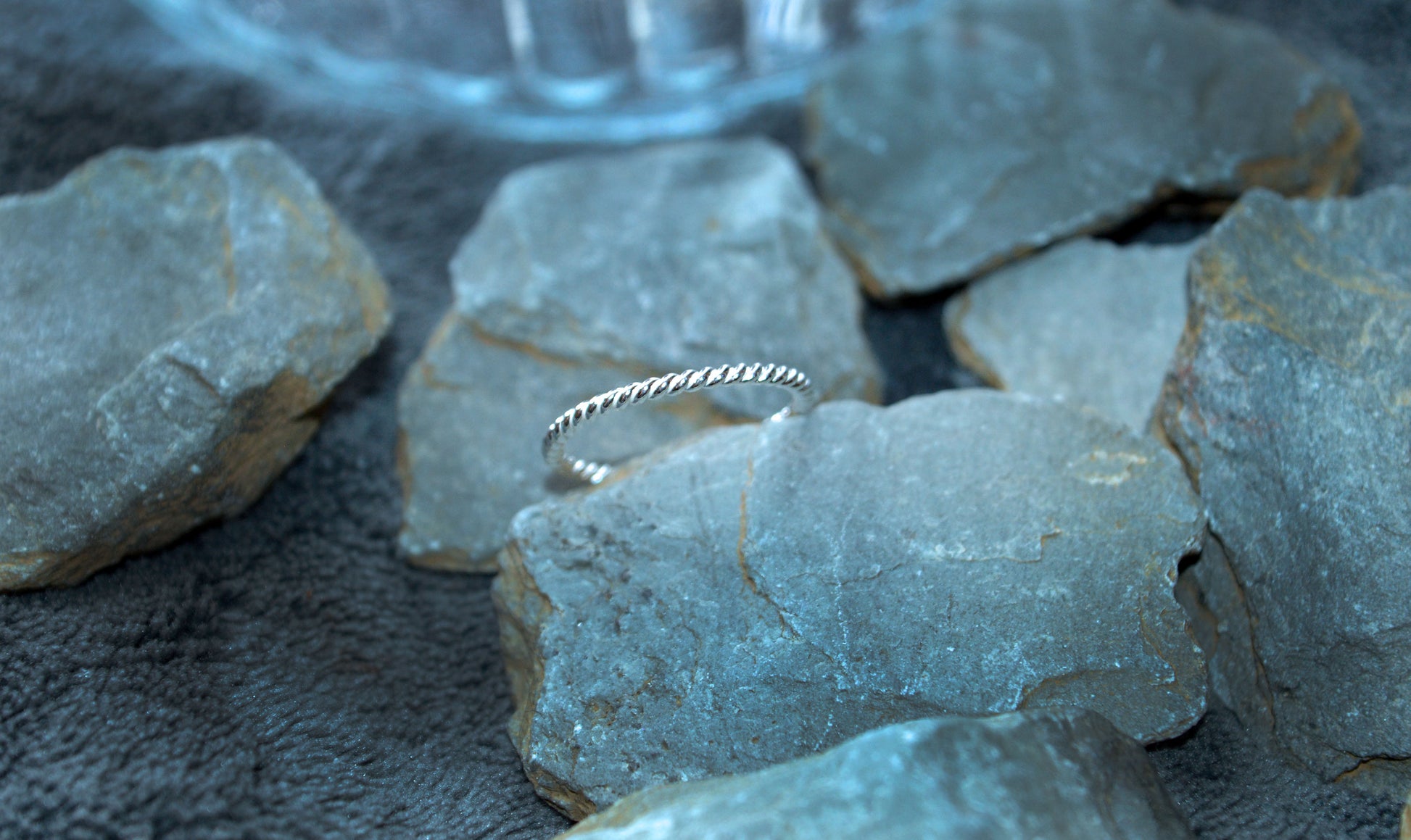 Thin sterling silver stacking ring. This twisted band ring makes the perfect stacking ring.